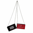 Two rectangular signs, one black with 'Circo Nero' and one red with text, hanging from strings on a white background.