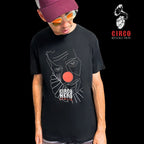 Person wearing a black t-shirt with a graphic design and 'Circo Nero' text, standing against a black background with 'Circo Revolution' logo. Circo Nero Italian t-shirt