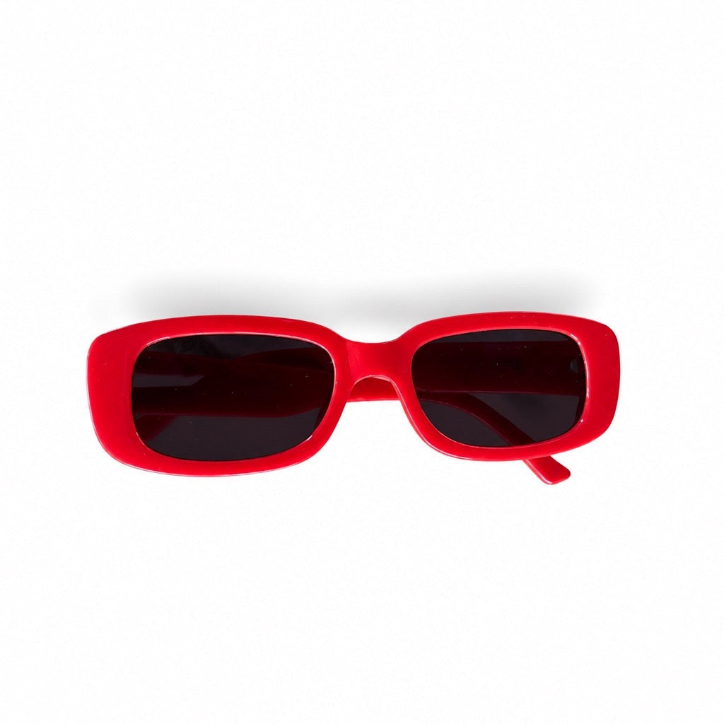 Bright red square sunglasses with dark tinted lenses, shown from a front-facing perspective on a clean white background.