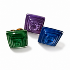 Three square glass stud earrings in green, purple, and blue, arranged on a clean white background. Silvia Tolomei best handmade jewelry in Tuscany. Tuscany jewelry.