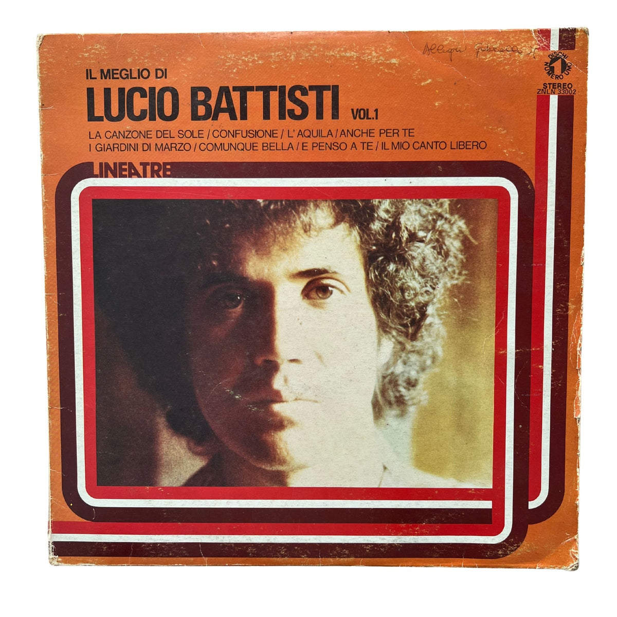 Vinyl record album cover for 'Il Meglio di Lucio Battisti Vol.1' released by Lineare, featuring a portrait of Lucio Battisti on an orange background with red and white borders.