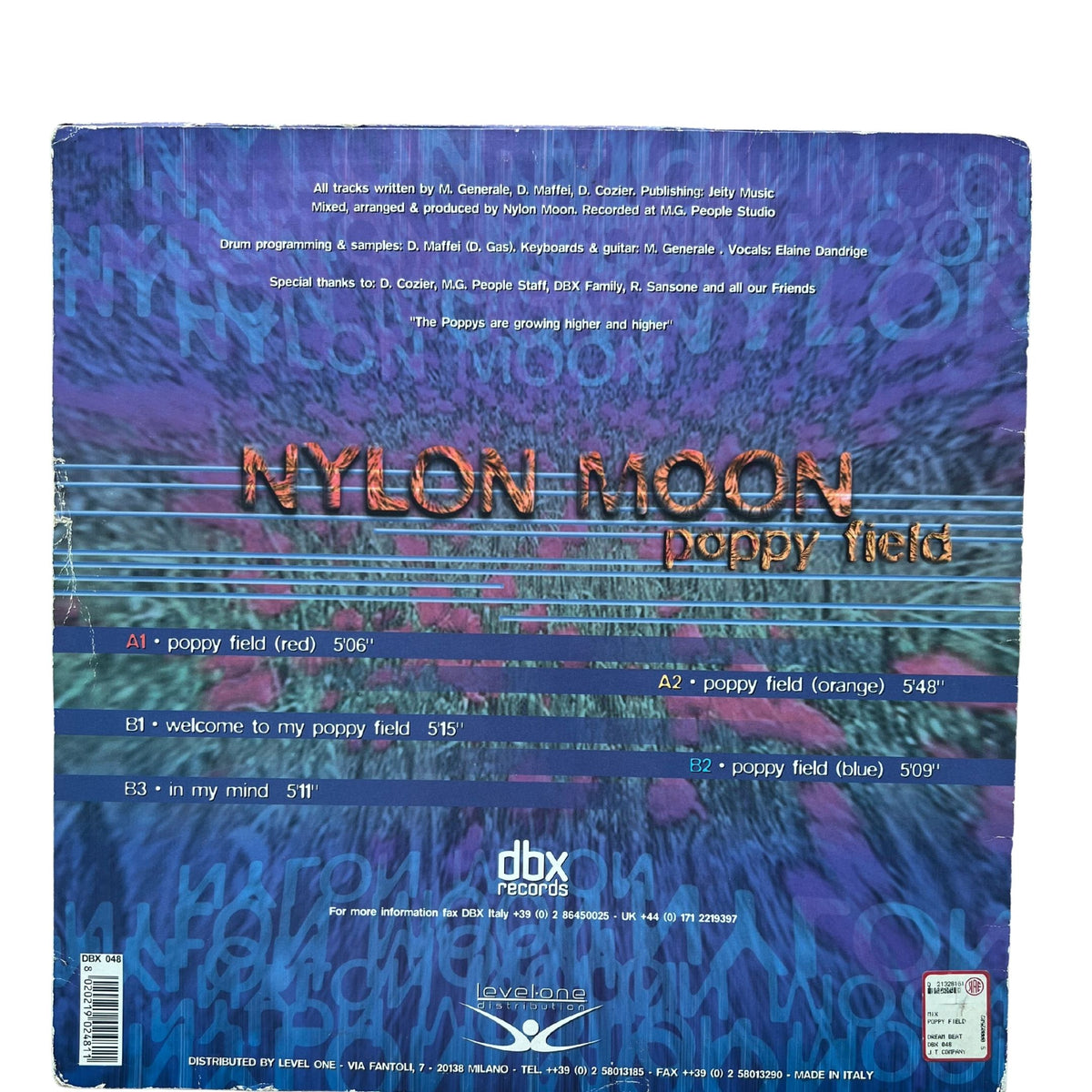 The back cover of a vinyl record for the album 'poppy field' by Nylon Moon, featuring a colorful abstract background with purple, blue, and pink hues, tracklist details, and the 'dbx records' logo.