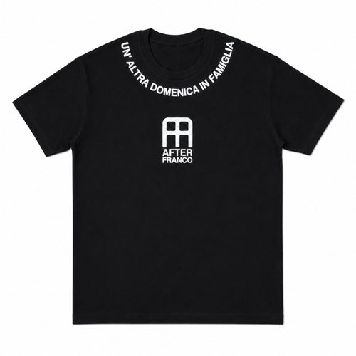 A black short-sleeve crewneck t-shirt with white printed graphics. The collar features the Italian phrase 'UN'ALTRA DOMENICA IN FAMIGLIA' in an arc, and the center chest displays a white logo with the text 'AFTER FRANCO'.