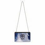 A rectangular shoulder bag with a chain strap, featuring a sky print with blue and white clouds and a black logo that reads 'AFTER FRANCO' on the front, set against a plain white background.