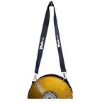 Yellow circular saw blade bag with black strap on a white background. francesca farfa musek label sorry im not a deejay vinyl purse