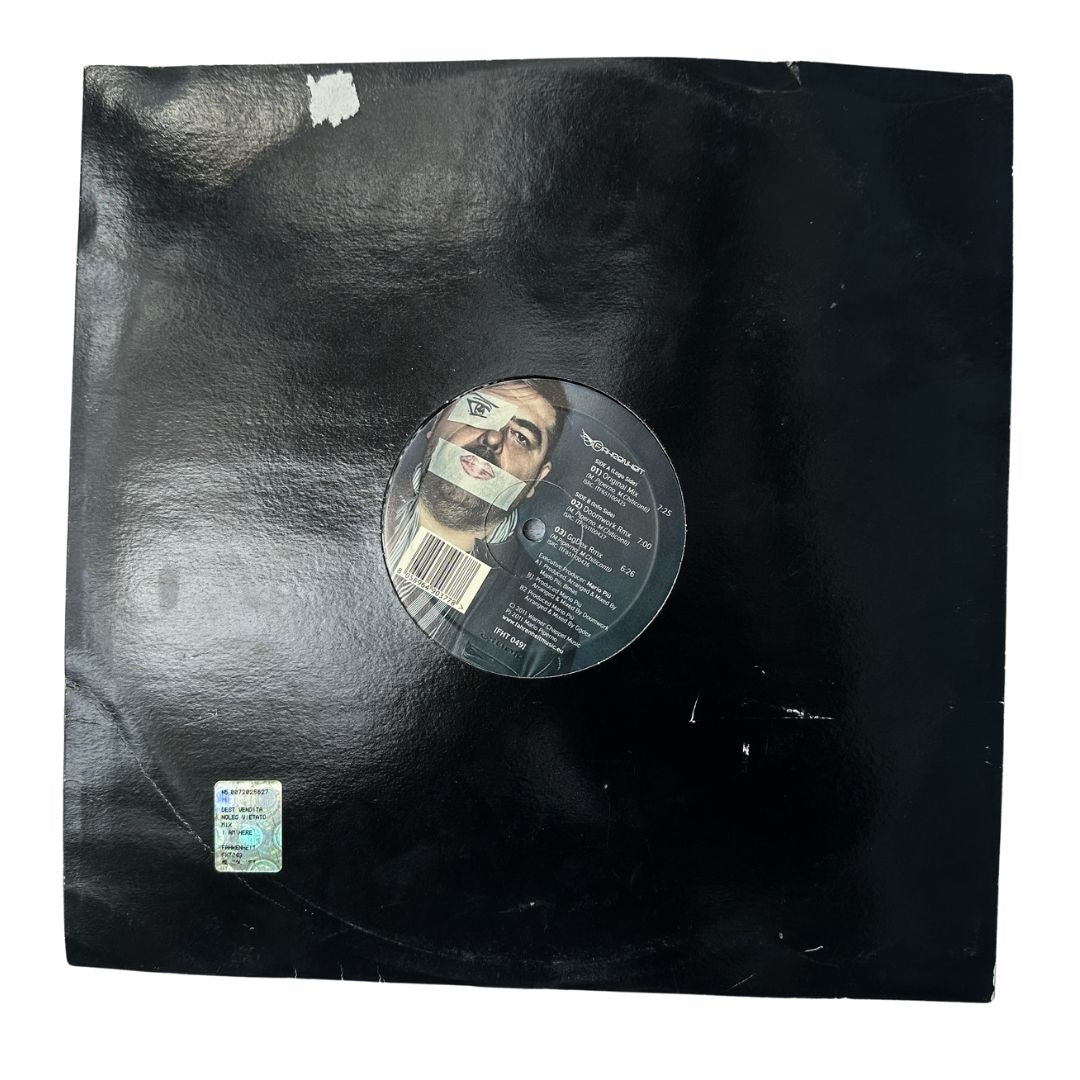 Vinyl record with a black cover and visible wear. mario piu